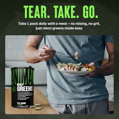 Person holding a plate of food next to Animal Daily Greens supplement pack.