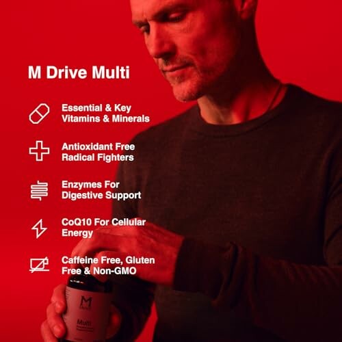 Man holding M Drive Multi supplement bottle with benefits listed.